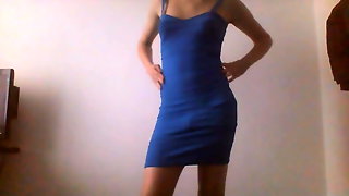 Sexy young crossdresser in blue dress