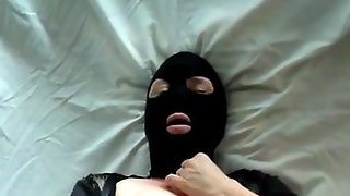 Masked orgasm in stockings