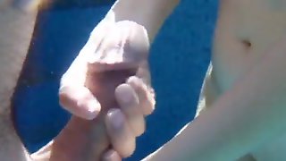 Wife pulling my cock underwater